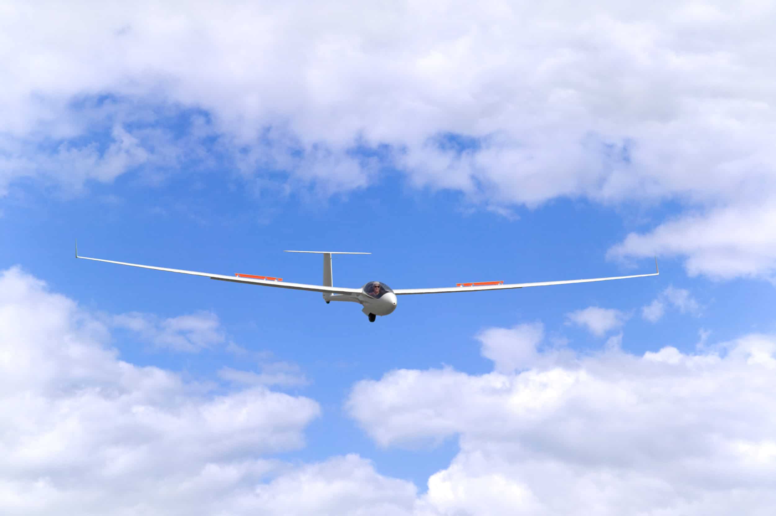 glider flying in the skies around the big water aero airport